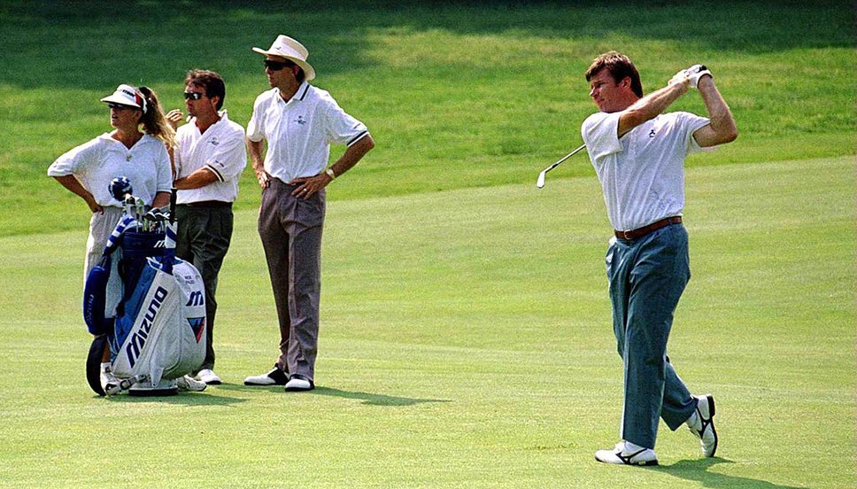 David Leadbetter watches his pupil, Nick Faldo