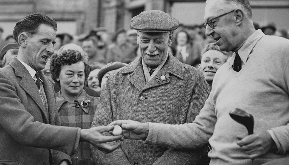 Willie Auchterlonie watches Francis Ouimet receive a ball at St Andrews