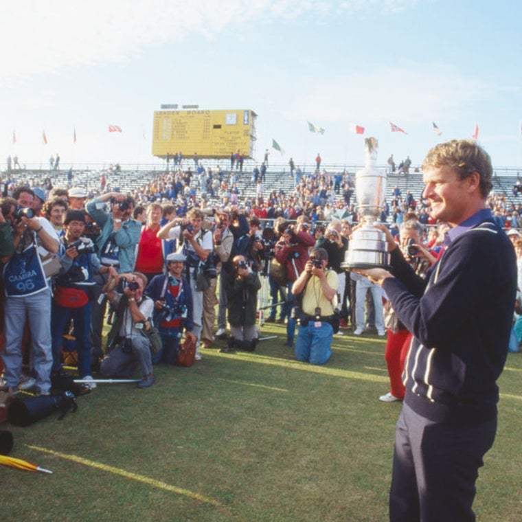Sandy Lyle poses with the Claret Jug after winning The Open