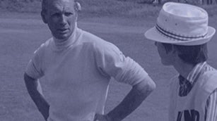 Max Faulkner chats to his caddie at The Open in 1971