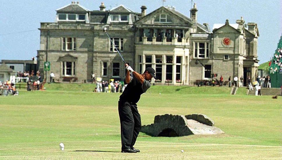 Tiger Woods tees off on St Andrews' 18th hole
