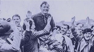 Fred Daly celebrates winning The Open in 1947