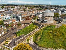 Aerial photograph of Drogheda showing the ancient Millmount Museum on a sunny morning