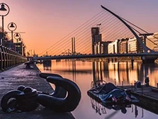 Sunrise in Dublin on the River Liffey with a view of the Samuel Beckett Bridge, Ireland