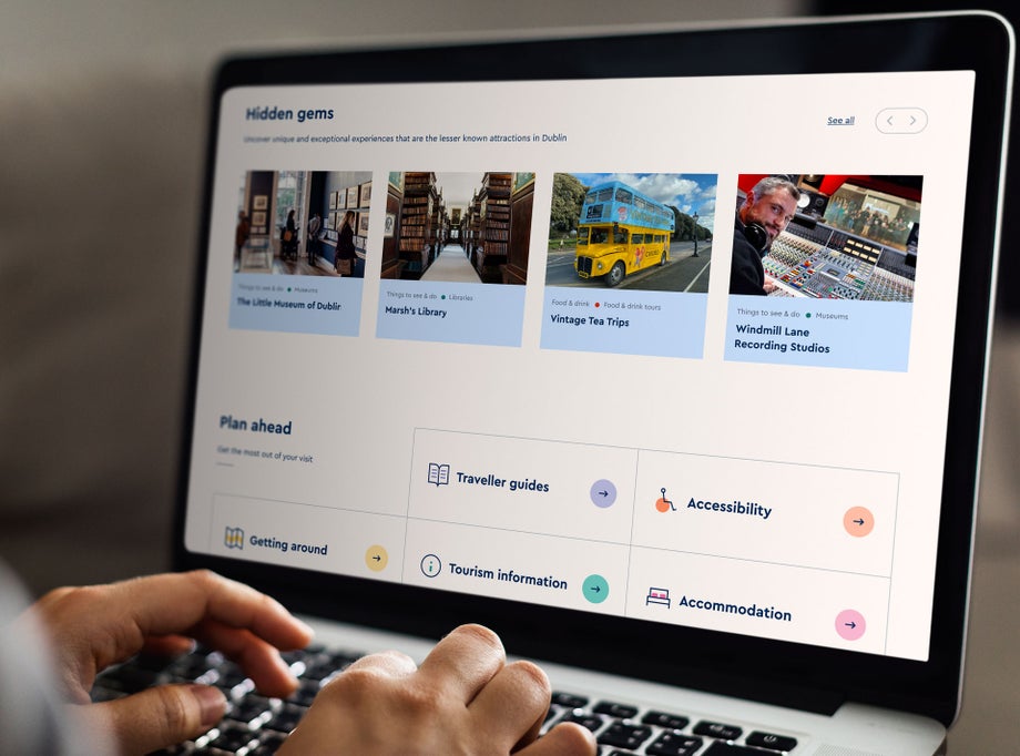 A person browses the Visit Dublin website on their laptop 