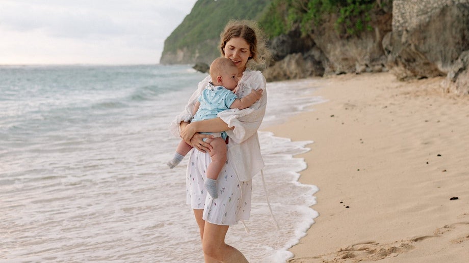 Mother and baby at the beach