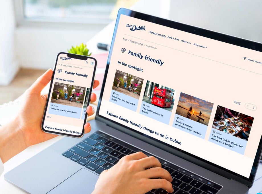 A persons uses the Visit Dublin website on desktop and mobile