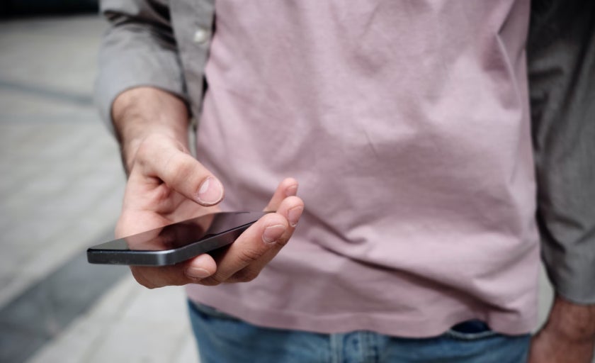 Person holding a smart phone