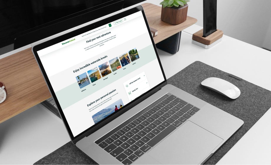 The Discover Ireland website showing on a laptop 