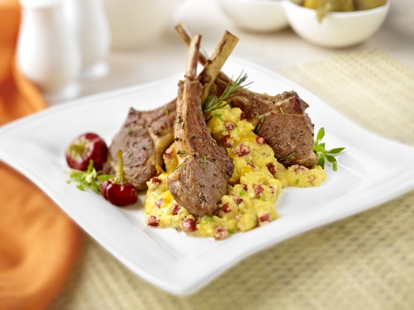 Pan Seared Rack of Lamb with Salami and Jalapeño Cheddar Polenta