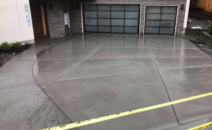 Freshly poured concrete driveway curing