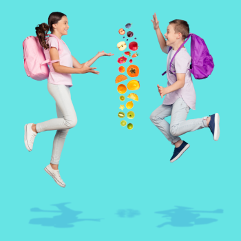 kids jumping up with veggies between them