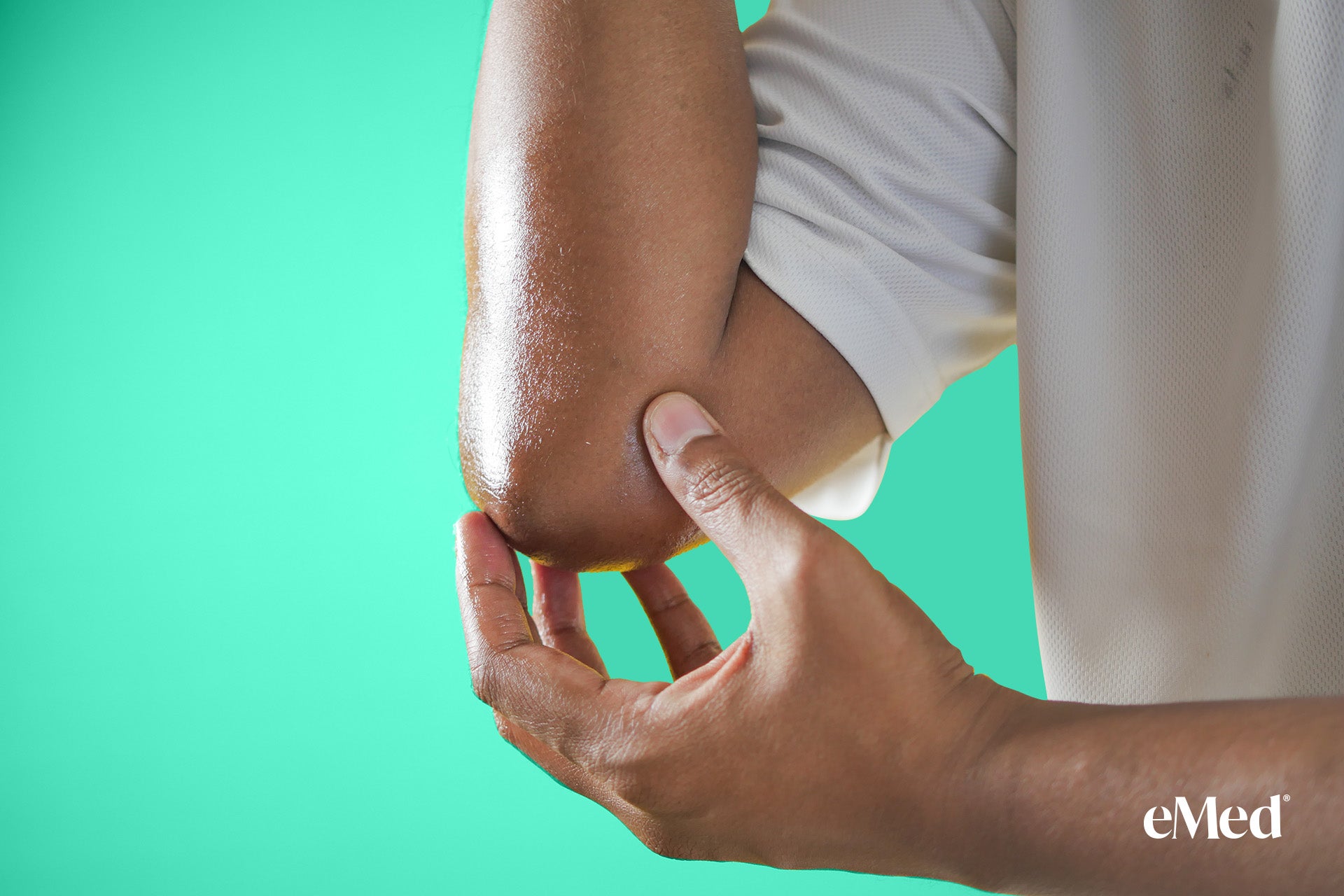 Golfer performing a forearm stretch for golfer's elbow relief