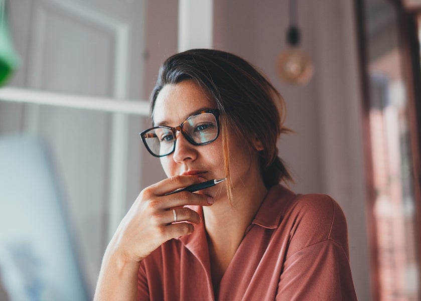 Business owner looking at computer