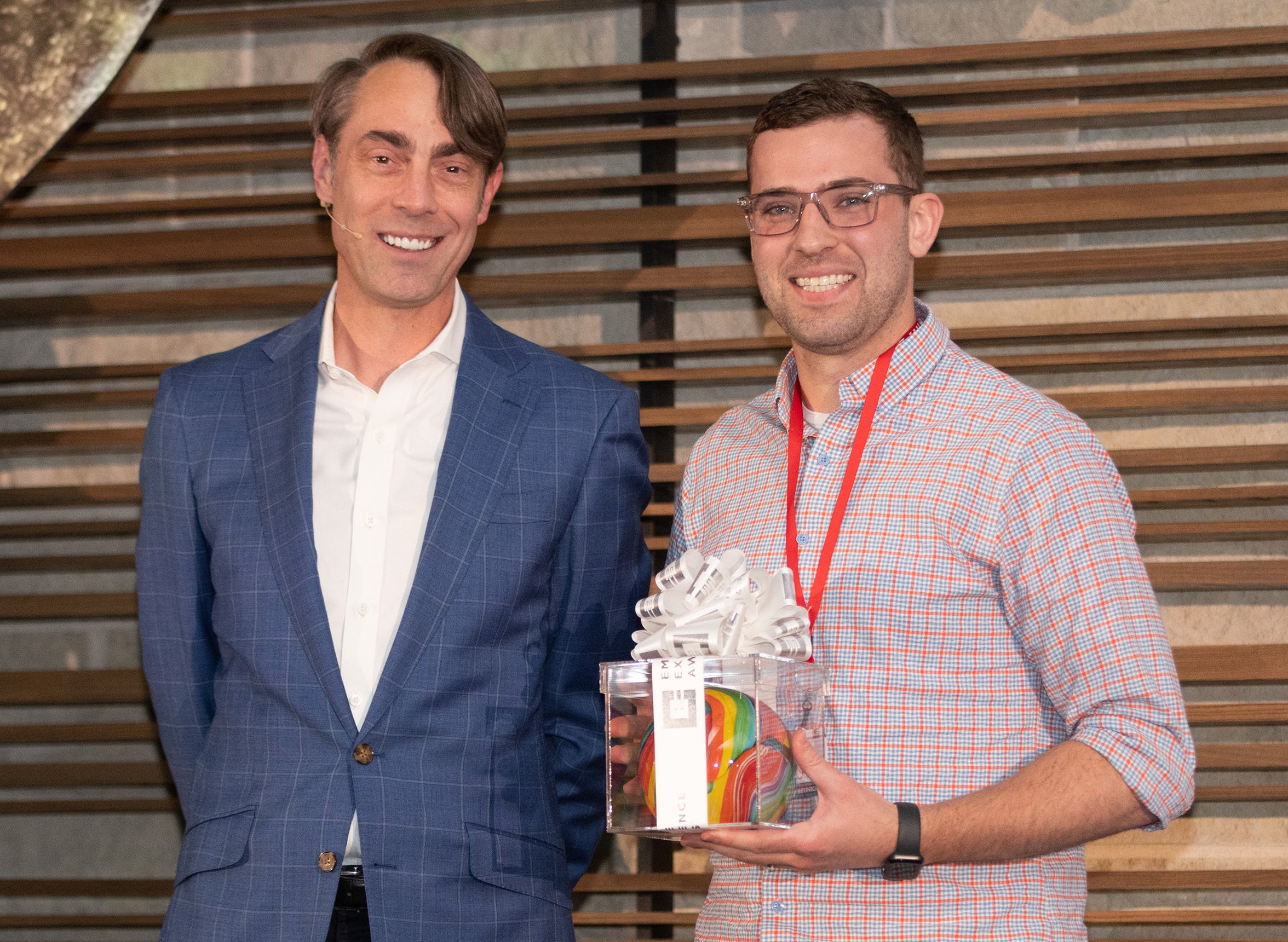 Josh Wiebe accepts award from Matt Michaelis