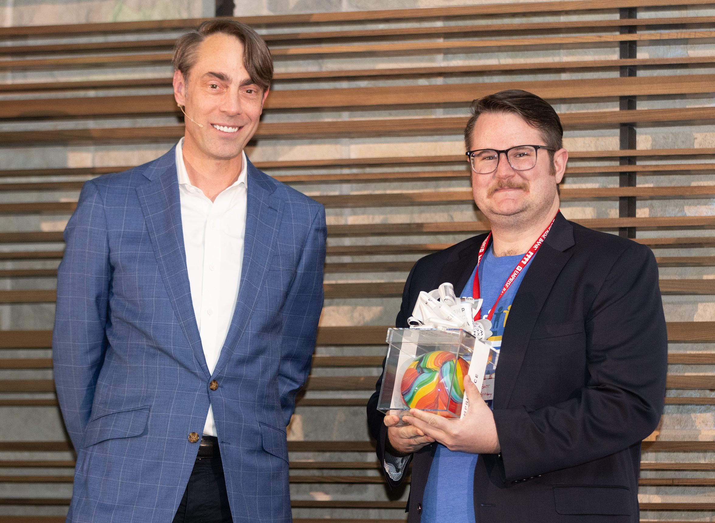 Michael accepts award from Matt Michaelis