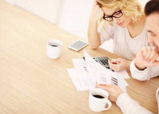 Couple looking at bills