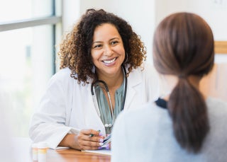 Doctor smiles at a patient