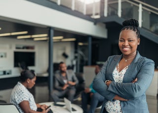 Business woman smiling in office