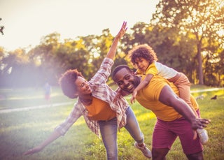 Family plays together outside