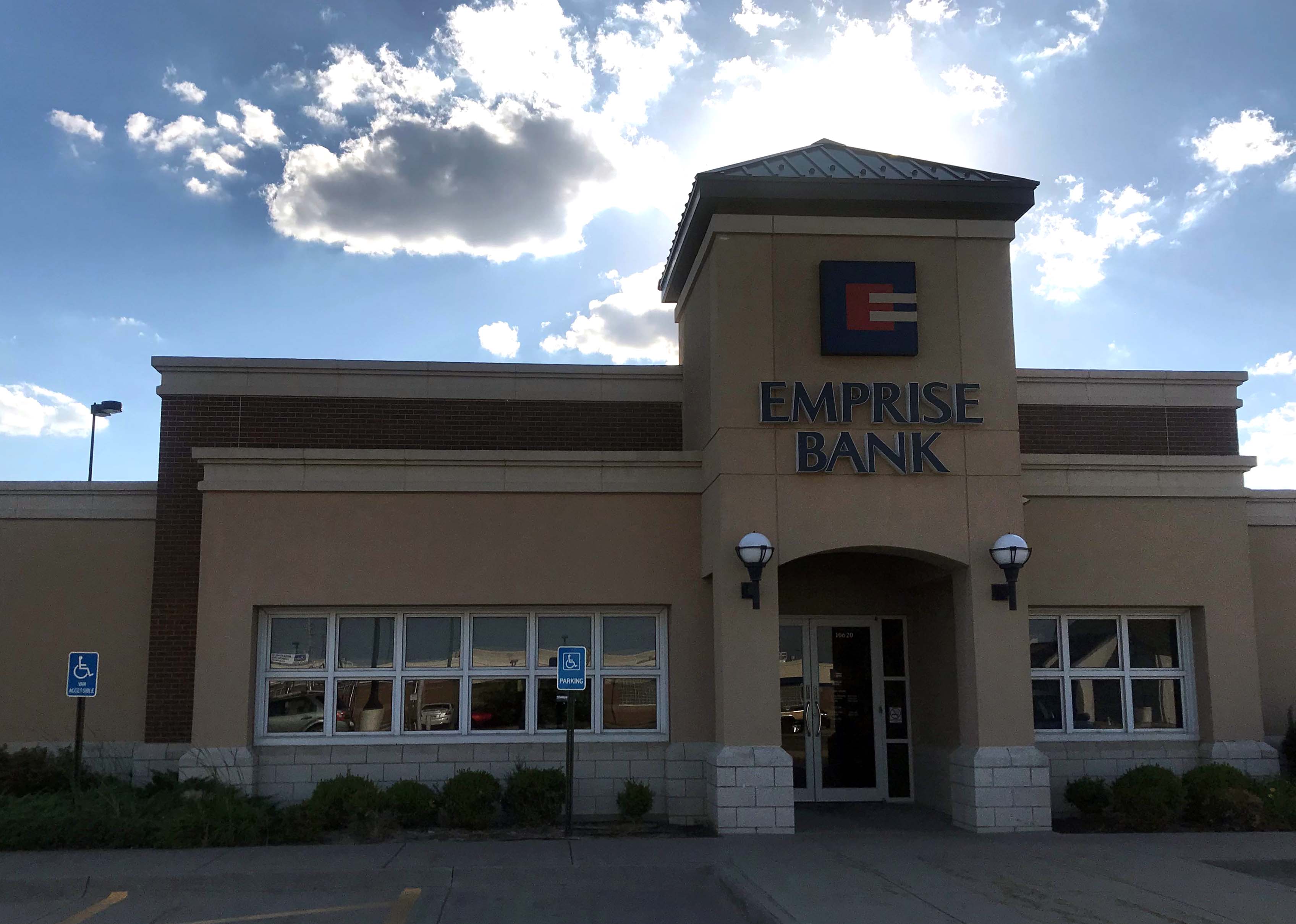 Emprise Bank branch with sun shining behind