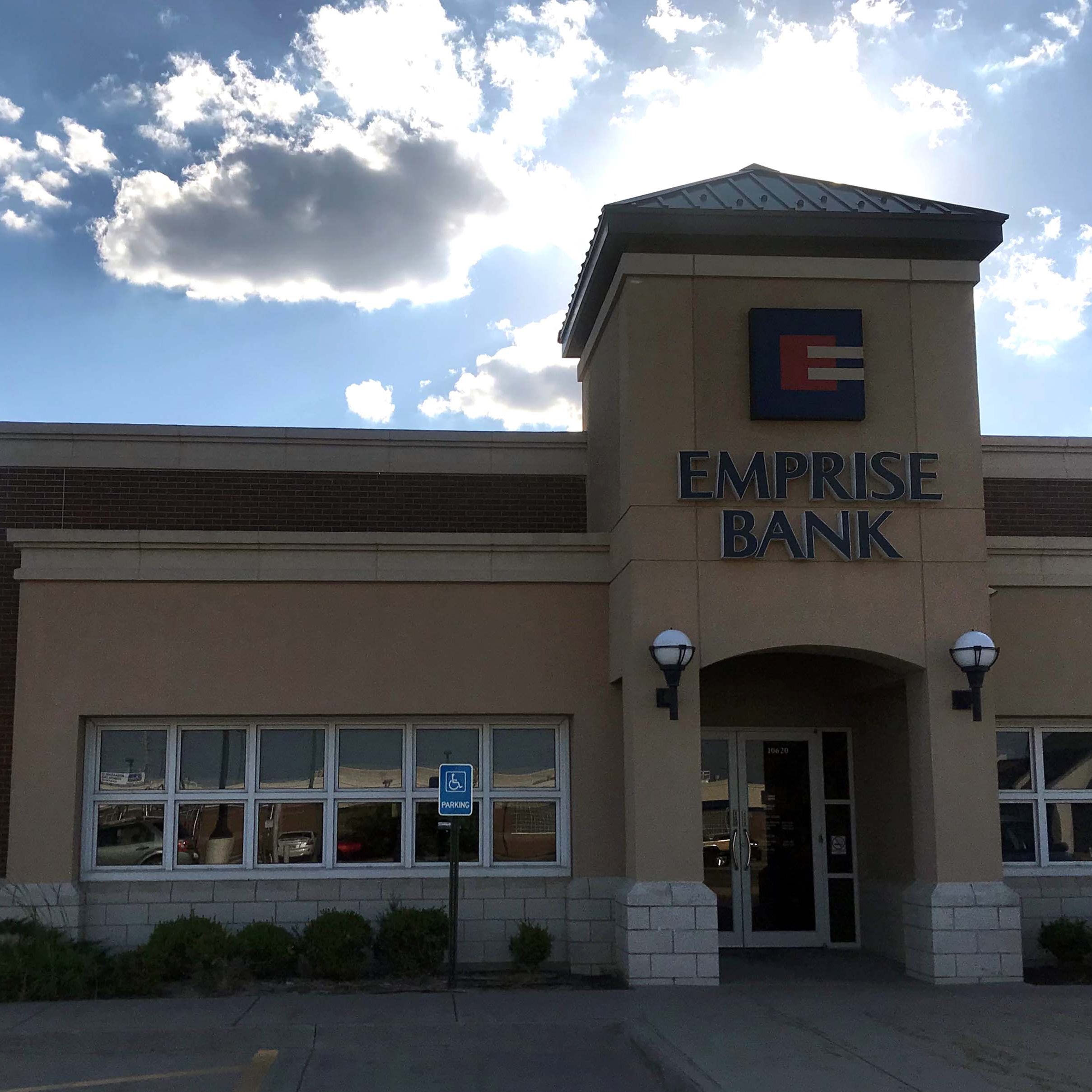 Emprise Bank branch with sun shining behind