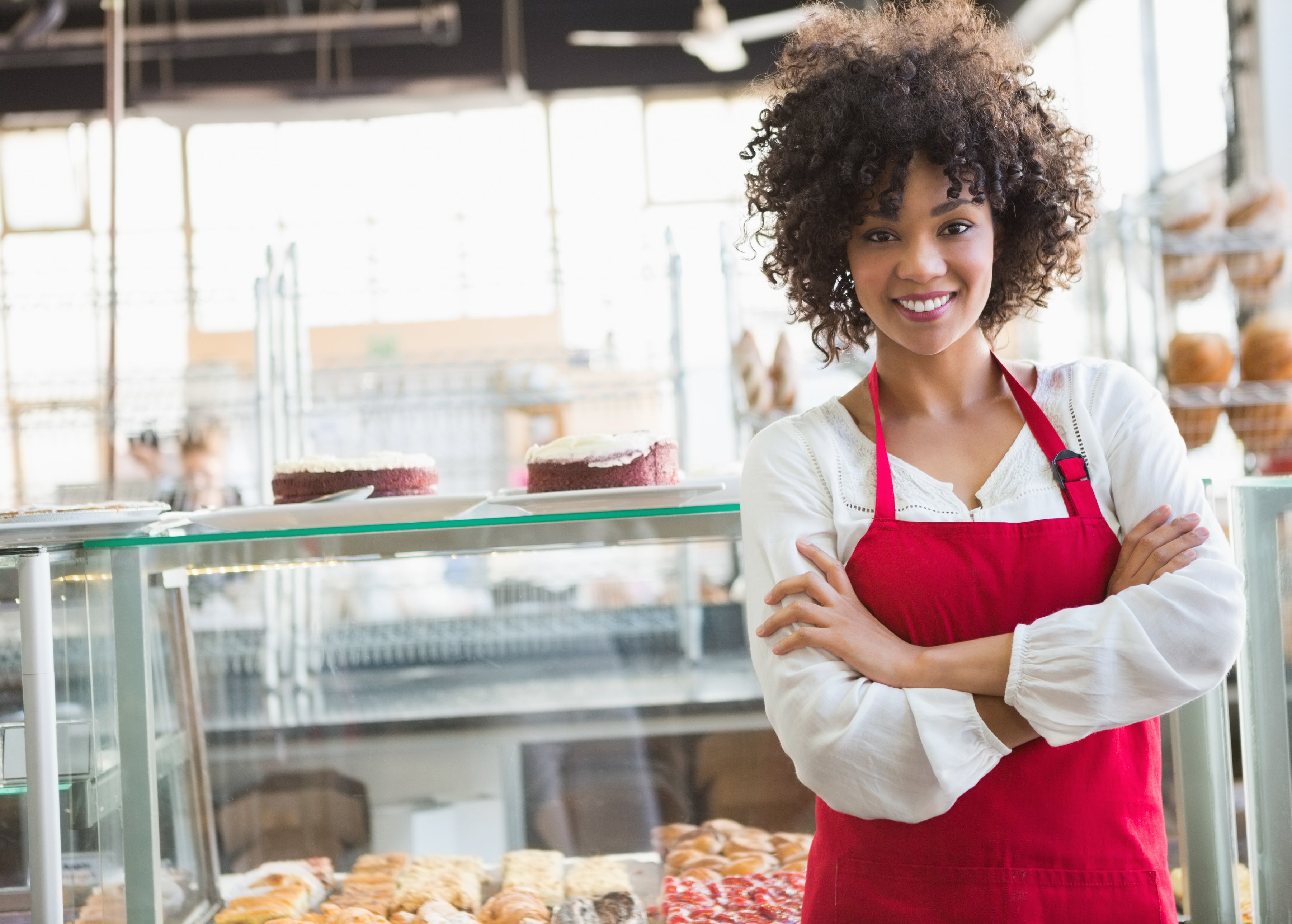 Business owner of bakery in apron