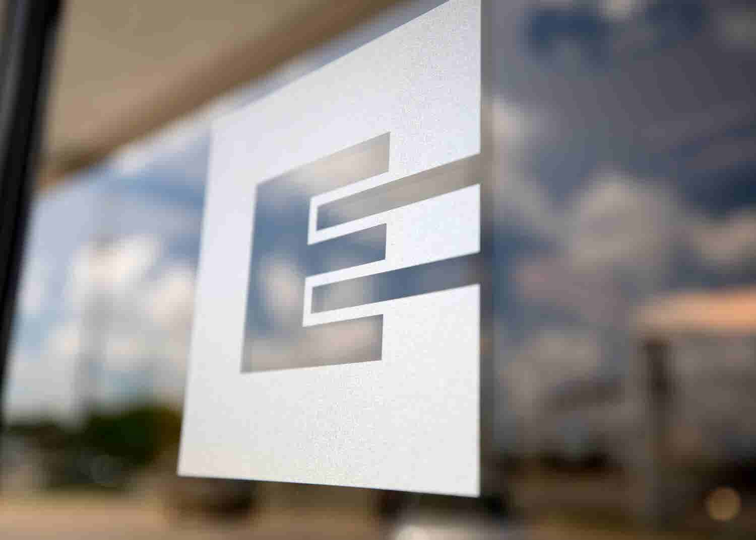 Emprise logo on glass window