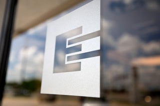 Emprise logo on glass window