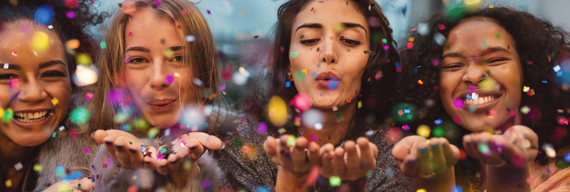 Friends celebrate with confetti
