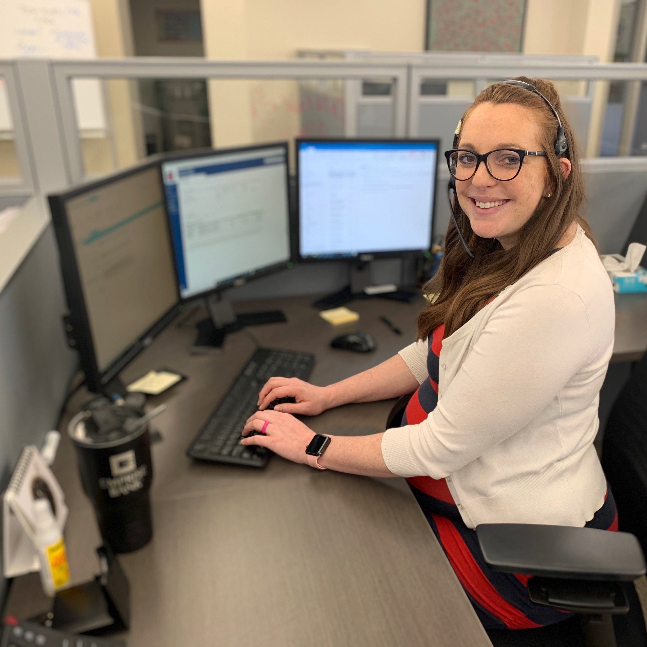 Smiling contact center employee