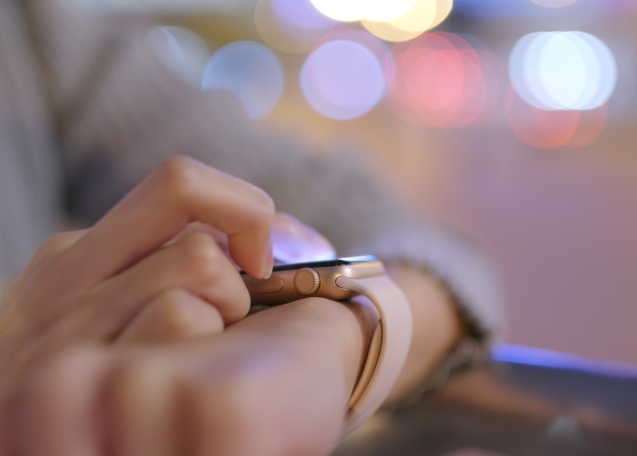 Hand typing on a smart watch