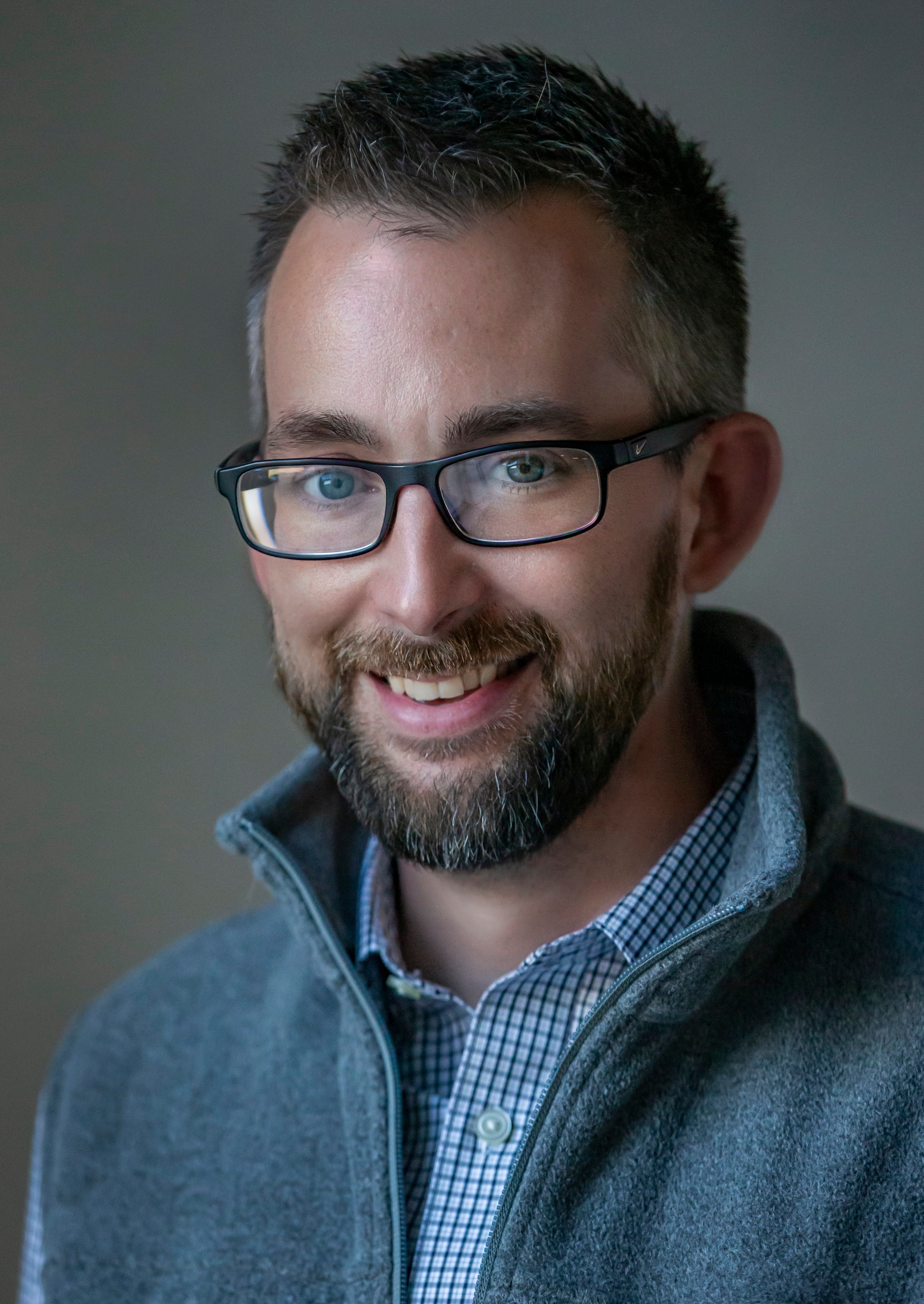 Josh Oeding smiling headshot
