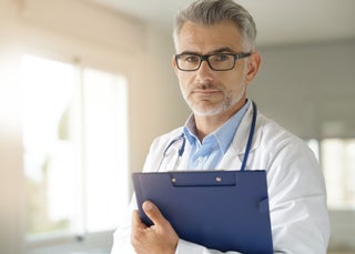 Doctor holding a clipboard