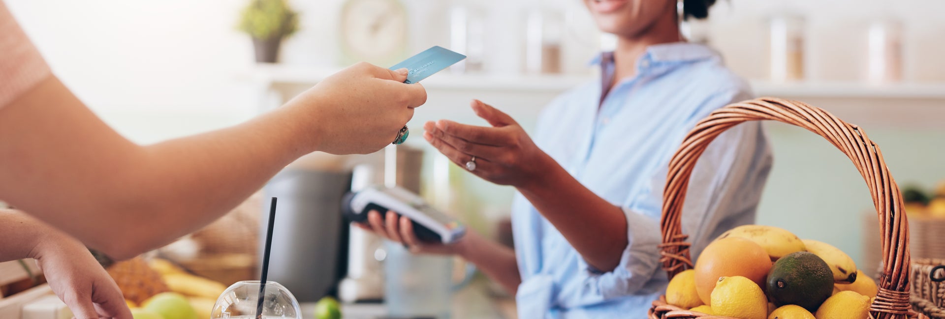 Customer pays for green juice with card