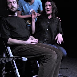 Vaněk looks away while Michal and Věra flirt.