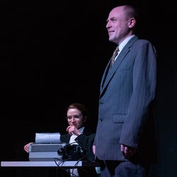 Domin (Aaron Collier) and Sulla (Yana Oliynyk) responding to customers.