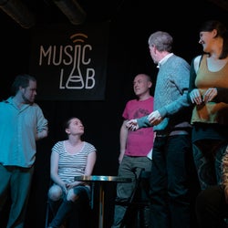 Actors enjoying a moment during rehearsal