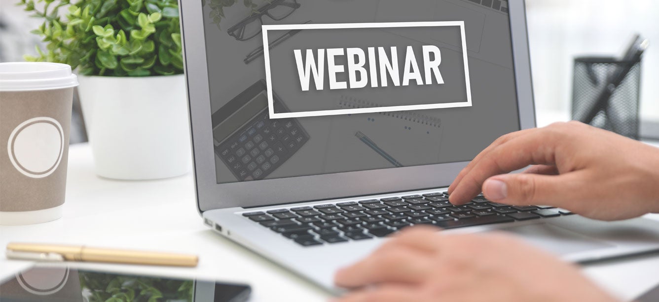 A laptop with the word "Webinar" is pictured with hands getting ready to type.