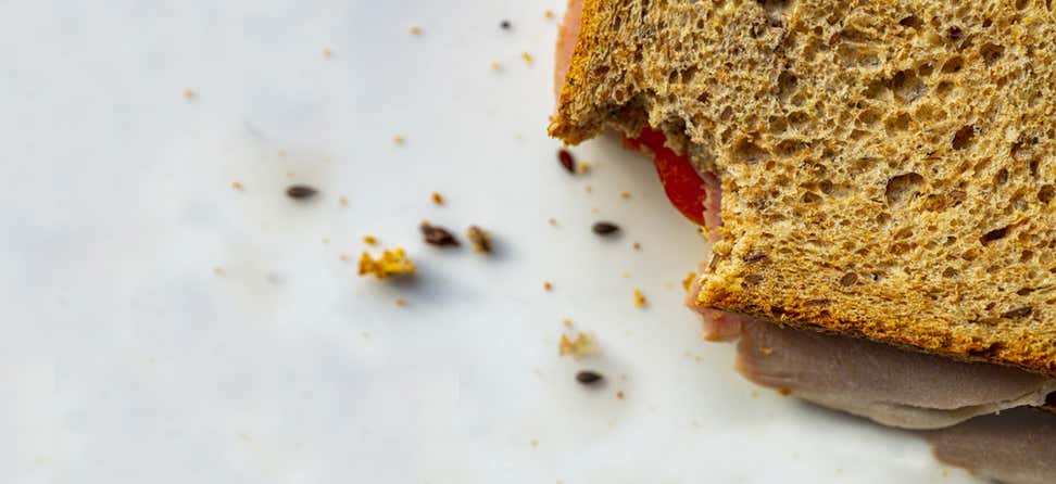 Up close shot of a sandwich that's been bitten into.