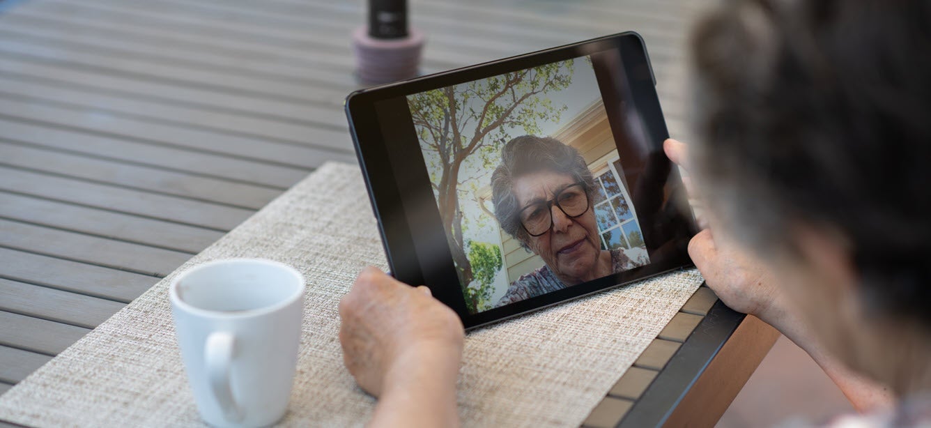Older woman doing a video call on a tablet