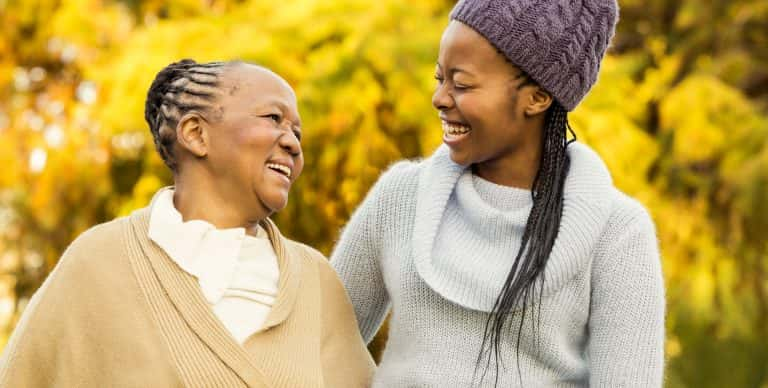 african-american-mother-and-daughter-walking